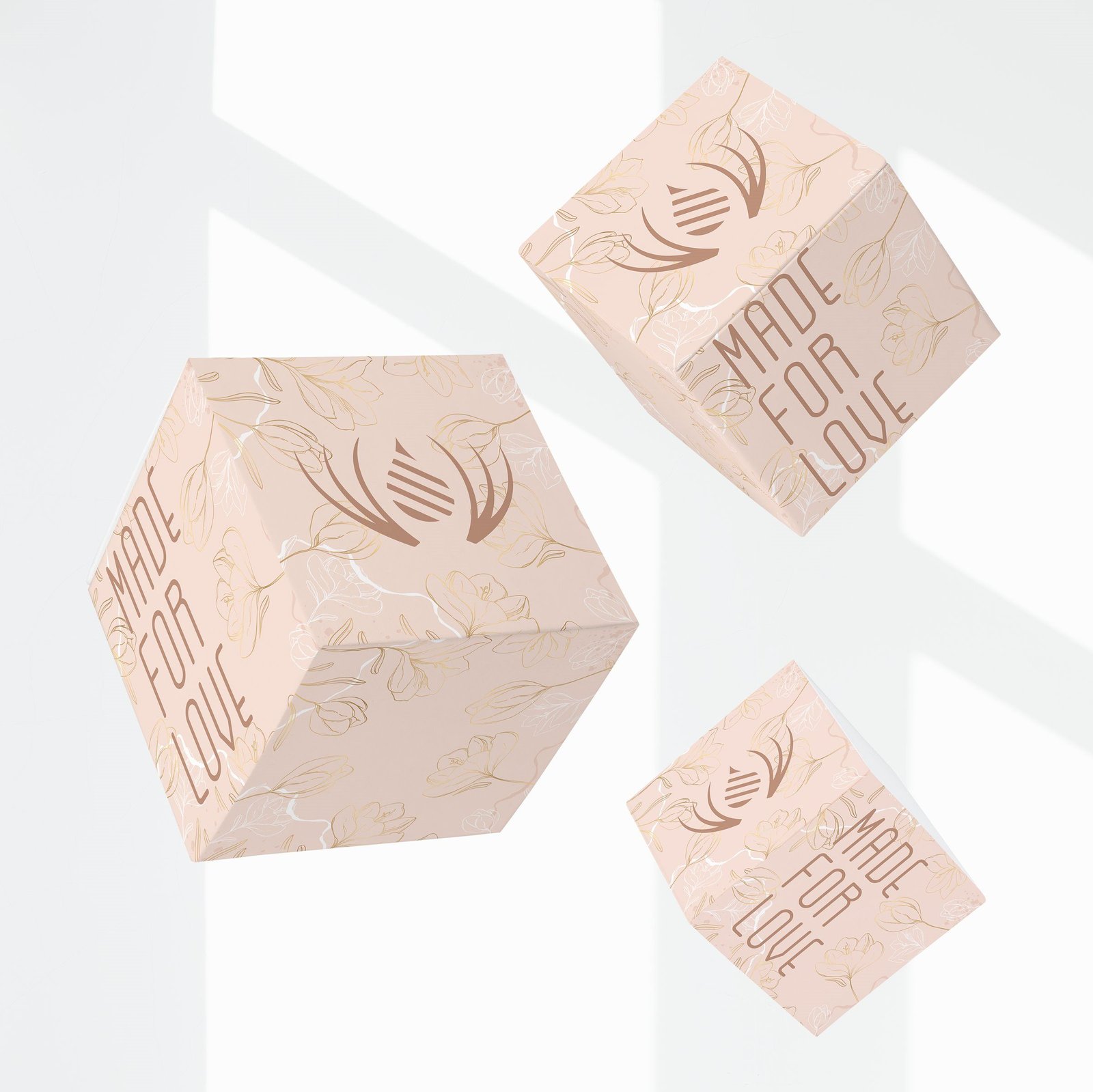 Three blush gift boxes floating in soft light, wrapped in copper floral line-work, with the Zest mark and “Made for love” set vertically.